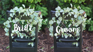 
                  
                    Bride and Groom Chair Signs - White Acrylic
                  
                